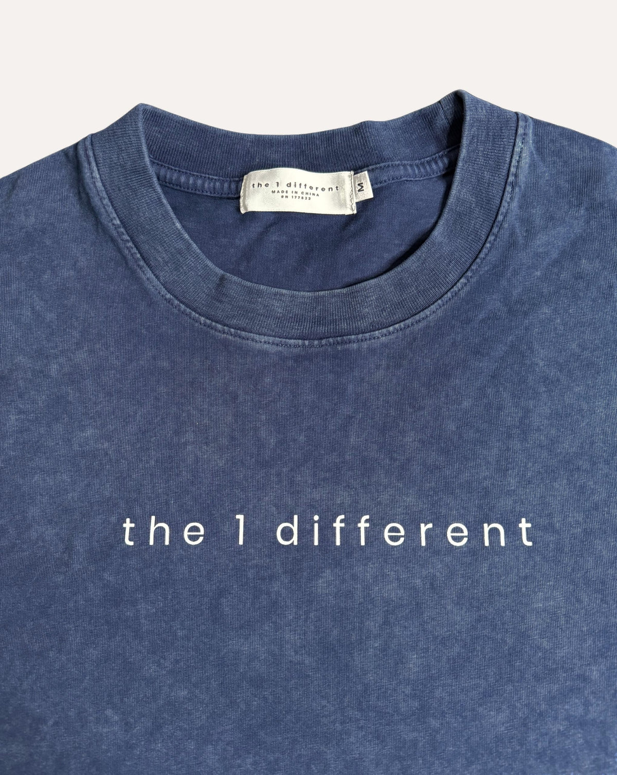 Royal Blue the1different snow-wash tee, collar label and chest print close-up